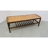 A MID CENTURY REMPLOY TEAK RECTANGULAR COFFEE TABLE WITH SLATTED SHELF BELOW W 44CM, L 125CM,