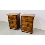A PAIR OF THREE DRAWER PINE BEDSIDE CABINETS WIDTH 43CM. DEPTH 33CM. HEIGHT 65CM.