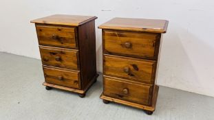 A PAIR OF THREE DRAWER PINE BEDSIDE CABINETS WIDTH 43CM. DEPTH 33CM. HEIGHT 65CM.