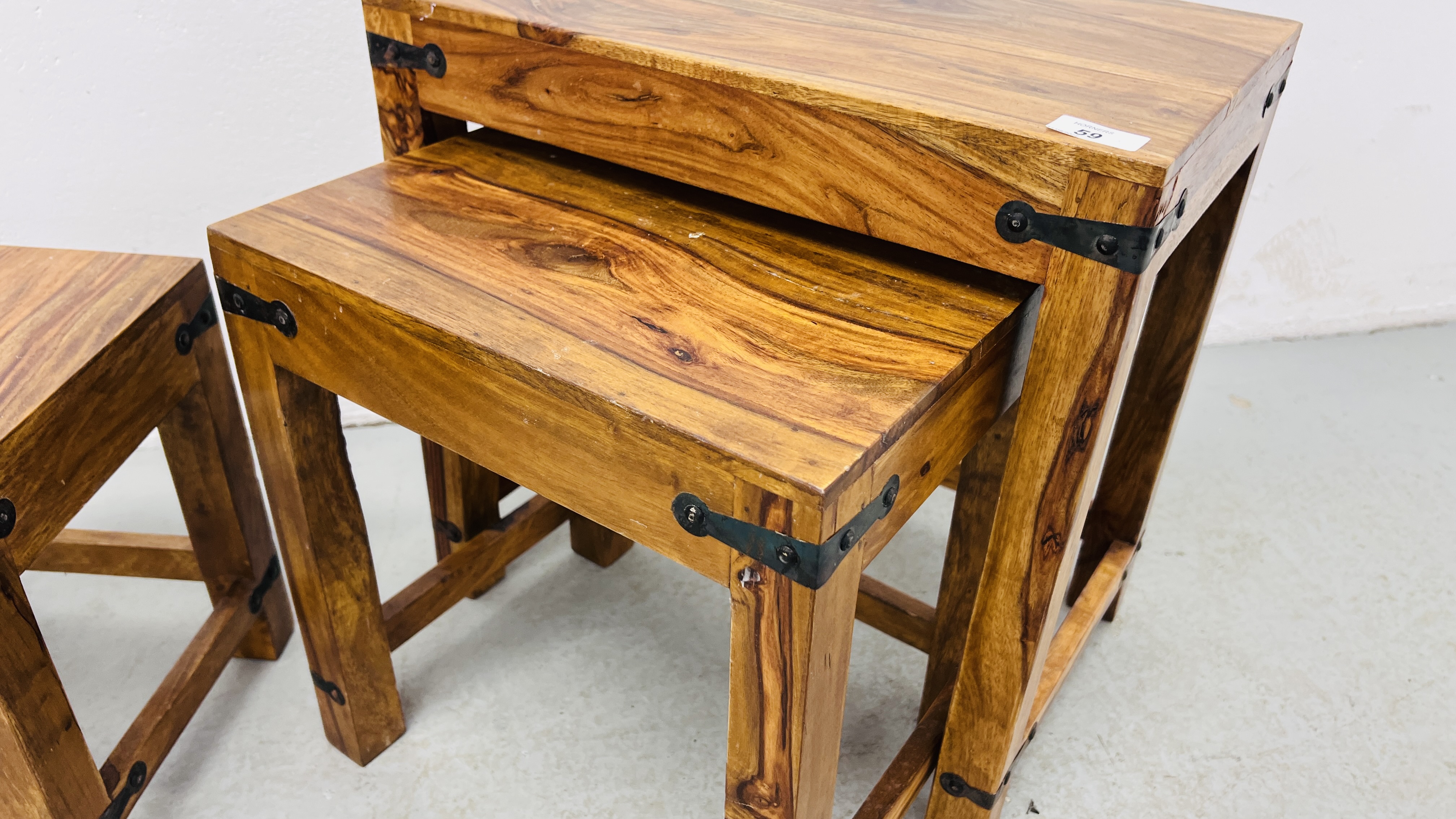 A NEST OF THREE MANGO WOOD GRADUATED TABLES. - Image 4 of 10