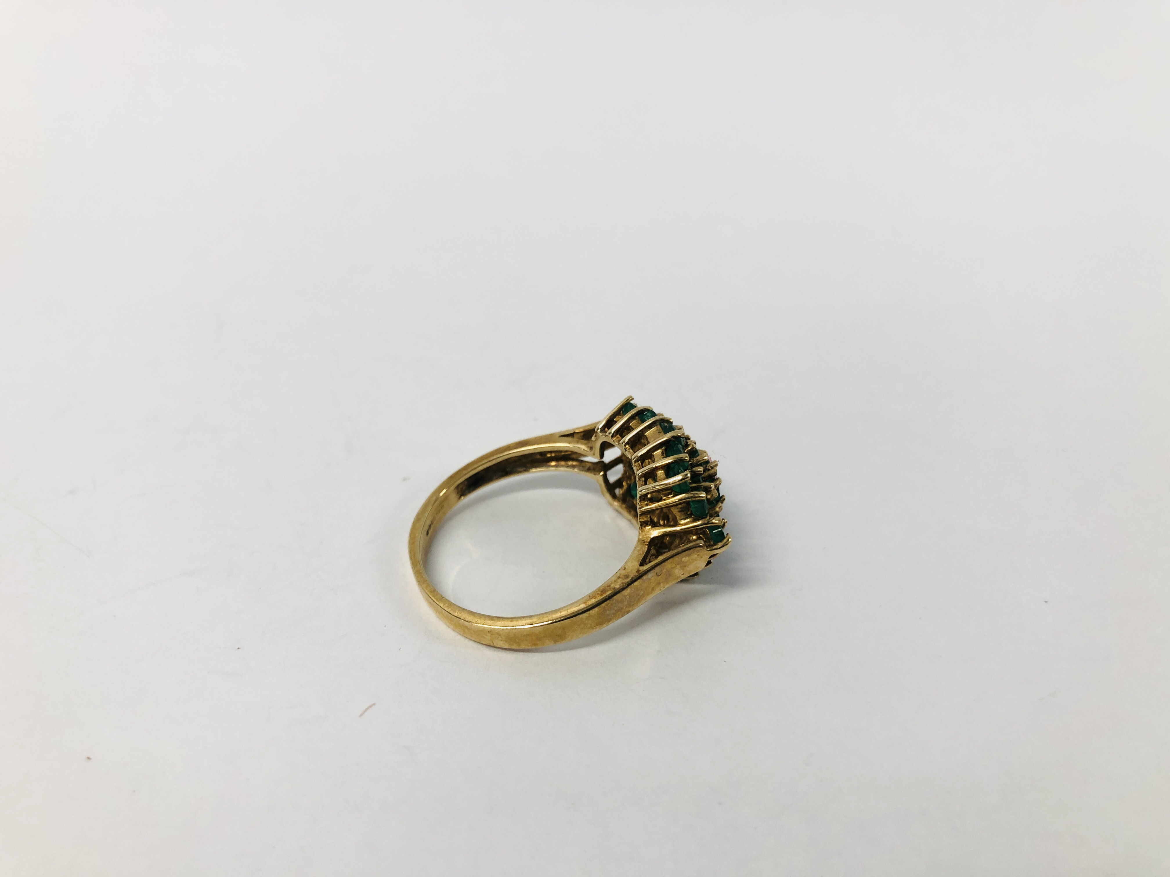 A 9CT. GOLD EMERALD CLUSTER RING. - Image 2 of 7