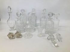 EIGHT GLASS DECANTERS ALONG WITH EXTRA STOPPERS AND STUART CRYSTAL CANDLE HOLDER