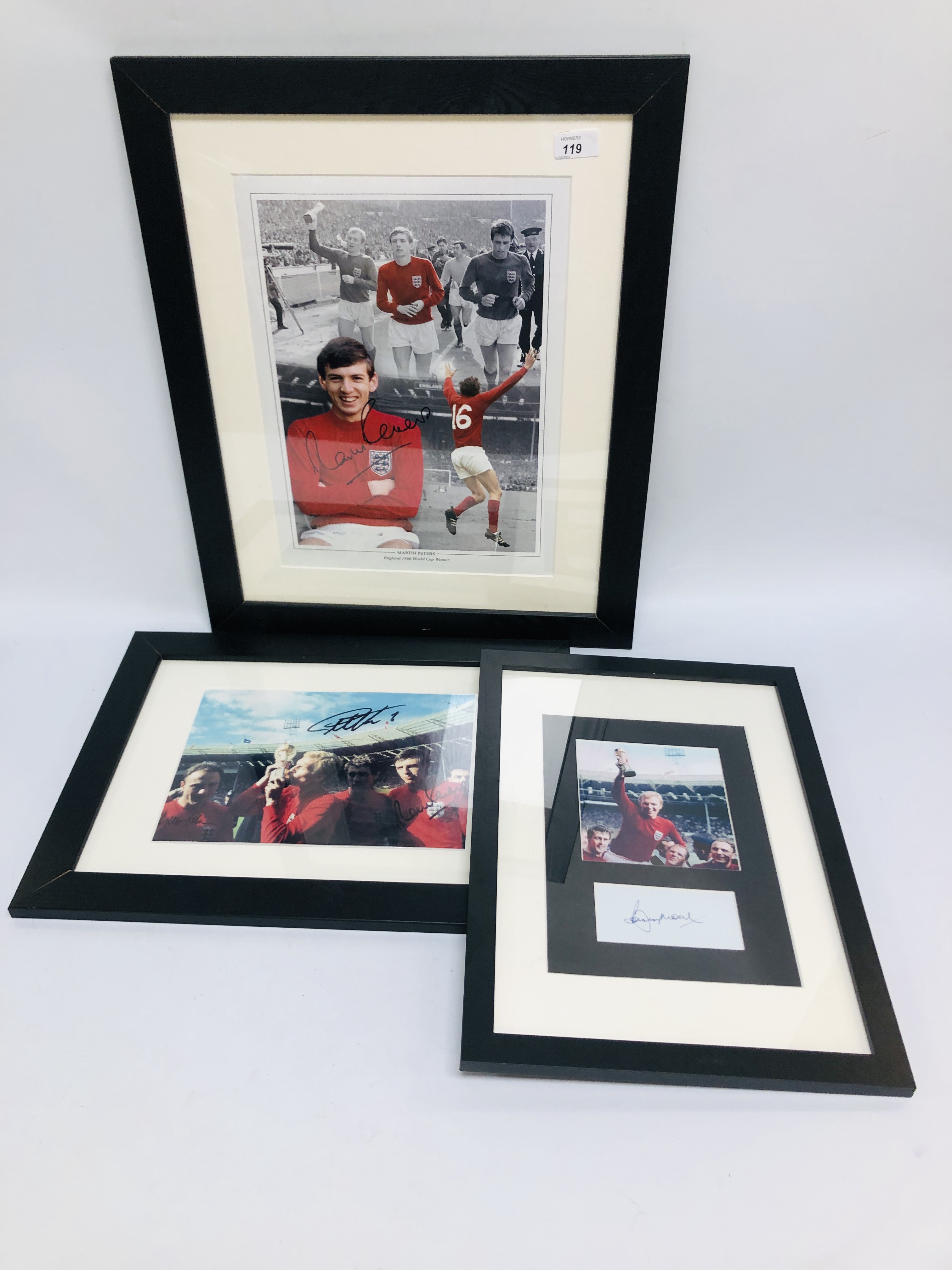 THREE FRAMED 1966 ENGLAND SIGNED PHOTOGRAPHS BEARING SIGNATURES BOBBY MOORE, MARTIN PETERS,