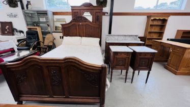 A DUTCH STYLE SOLID OAK FIVE PIECE BEDROOM SUITE COMPRISING OF DOUBLE BEDSTEAD WITH HIGH GROVE BEDS