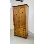 A GOOD QUALITY HONEY PINE TWO DOOR WARDROBE WITH TWO DRAWER BASE WIDTH 93CM. DEPTH 56CM.