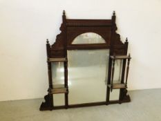 AN ORNATE MAHOGANY EDWARDIAN OVER MANTEL MIRROR.