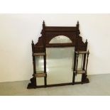 AN ORNATE MAHOGANY EDWARDIAN OVER MANTEL MIRROR.