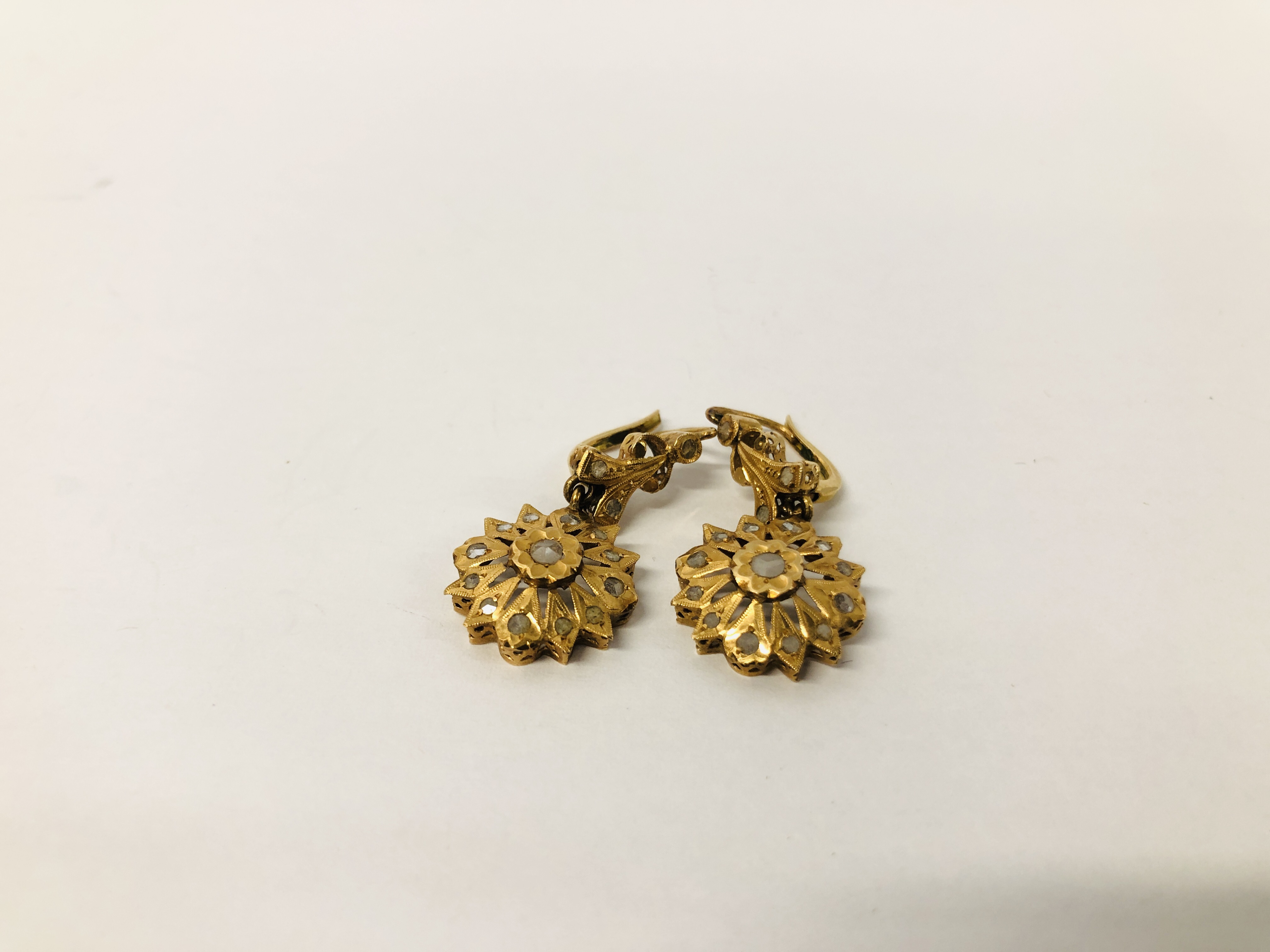 PAIR OF VINTAGE YELLOW METAL (INDISTINCT MARKS) STONE SET DROP STYLE EARRINGS.