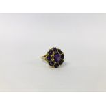 A 9CT. GOLD AMETHYST CLUSTER RING.