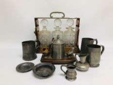 A PEWTER PIPE SMOKER STAND AND PEWTER ASHTRAY ALONG WITH AN OAK THREE BOTTLE TANTALUS (DAMAGE TO