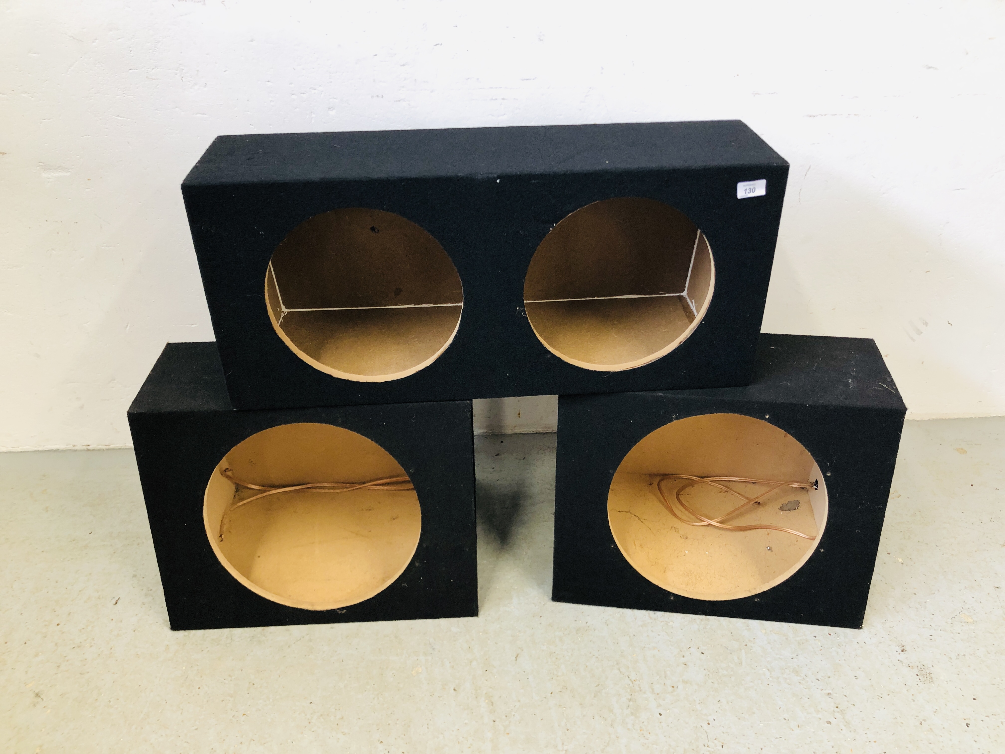 TWO SUBWOOFER SPEAKER SURROUNDS ALONG WITH DUEL SPEAKER WOODEN SURROUND - SOLD AS SEEN.