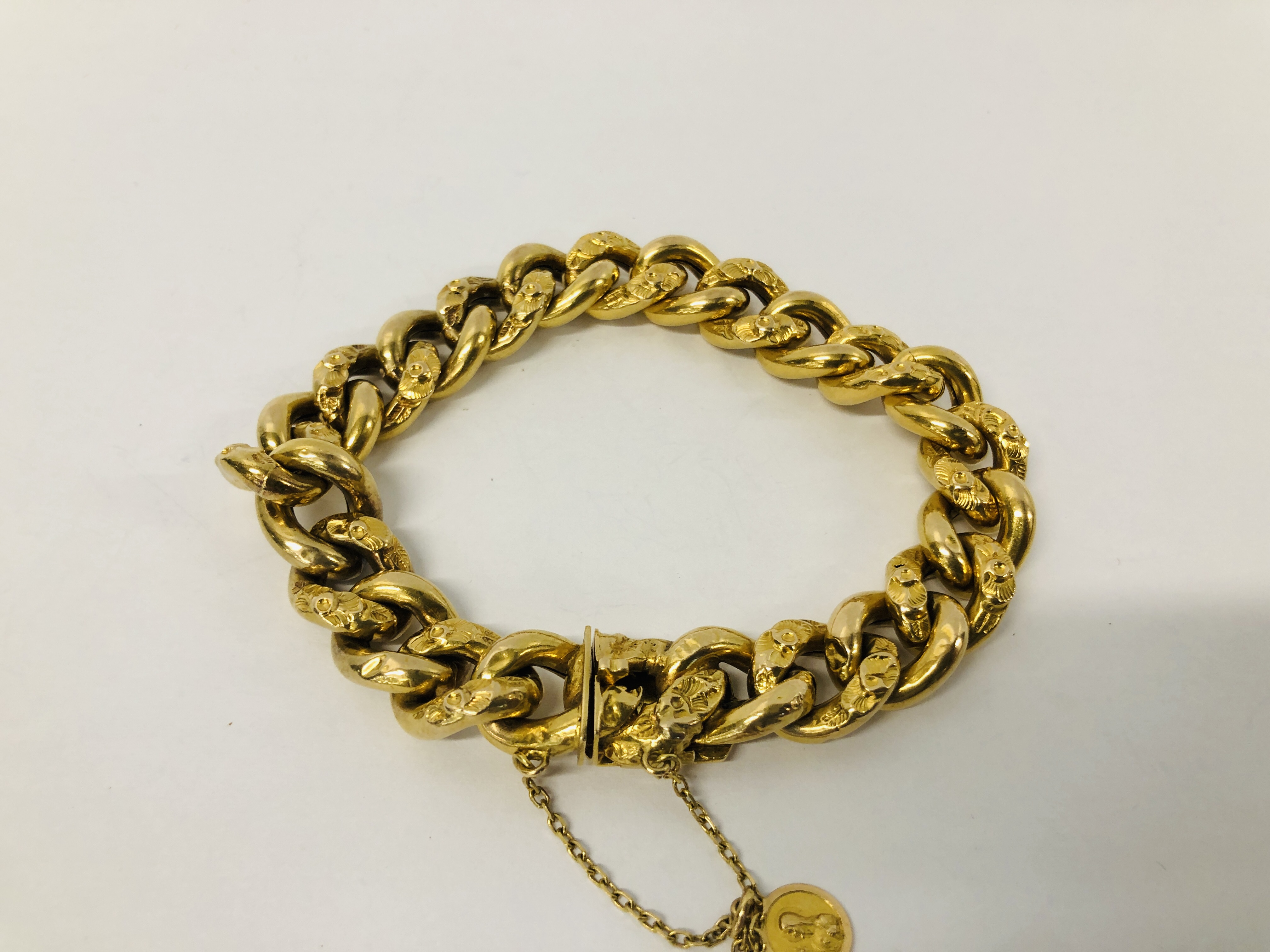 VINTAGE YELLOW METAL CURB BRACELET WITH SAFETY CHAIN (INDISTINCT MARKS). - Image 2 of 11