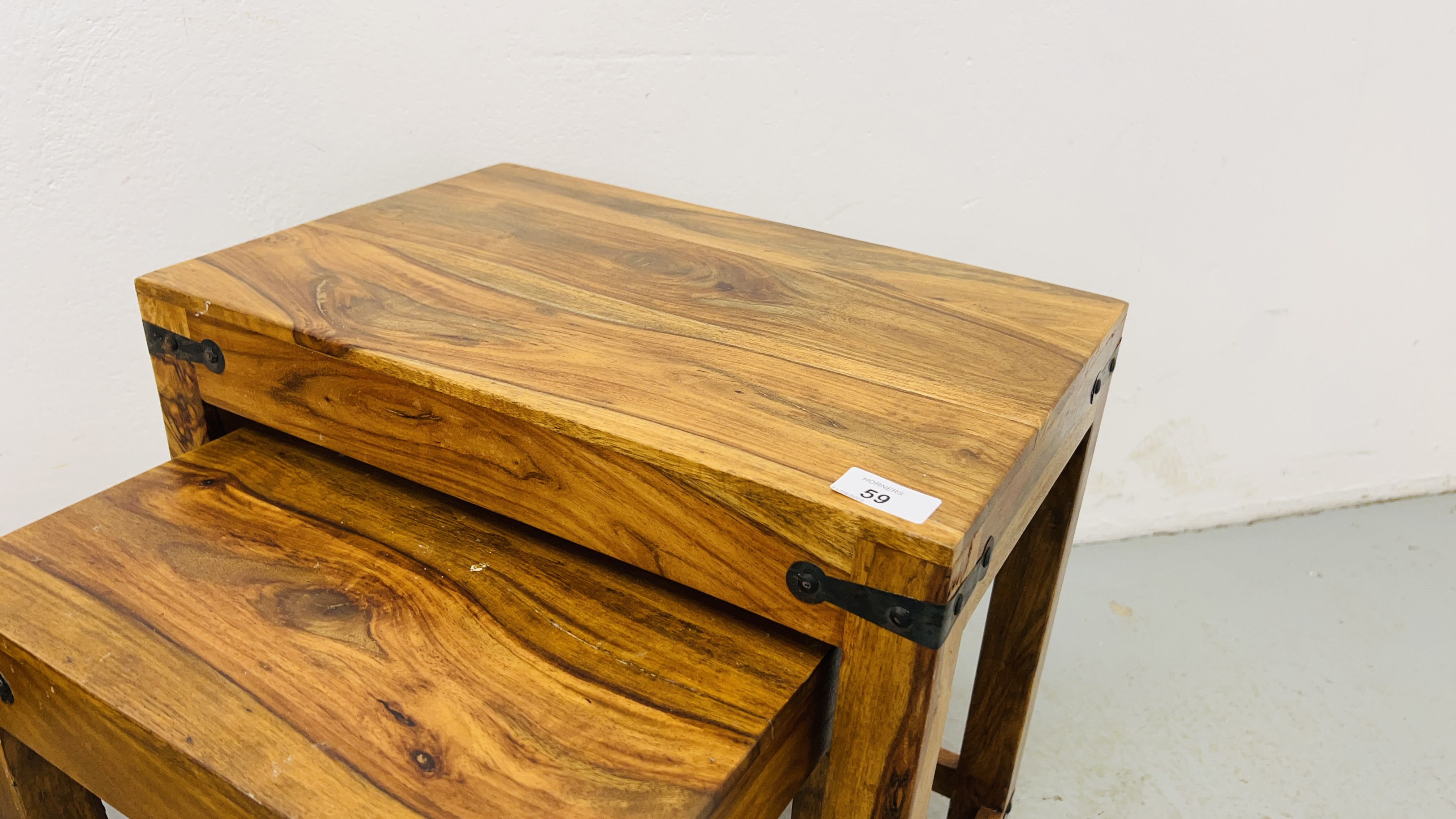 A NEST OF THREE MANGO WOOD GRADUATED TABLES. - Image 3 of 10