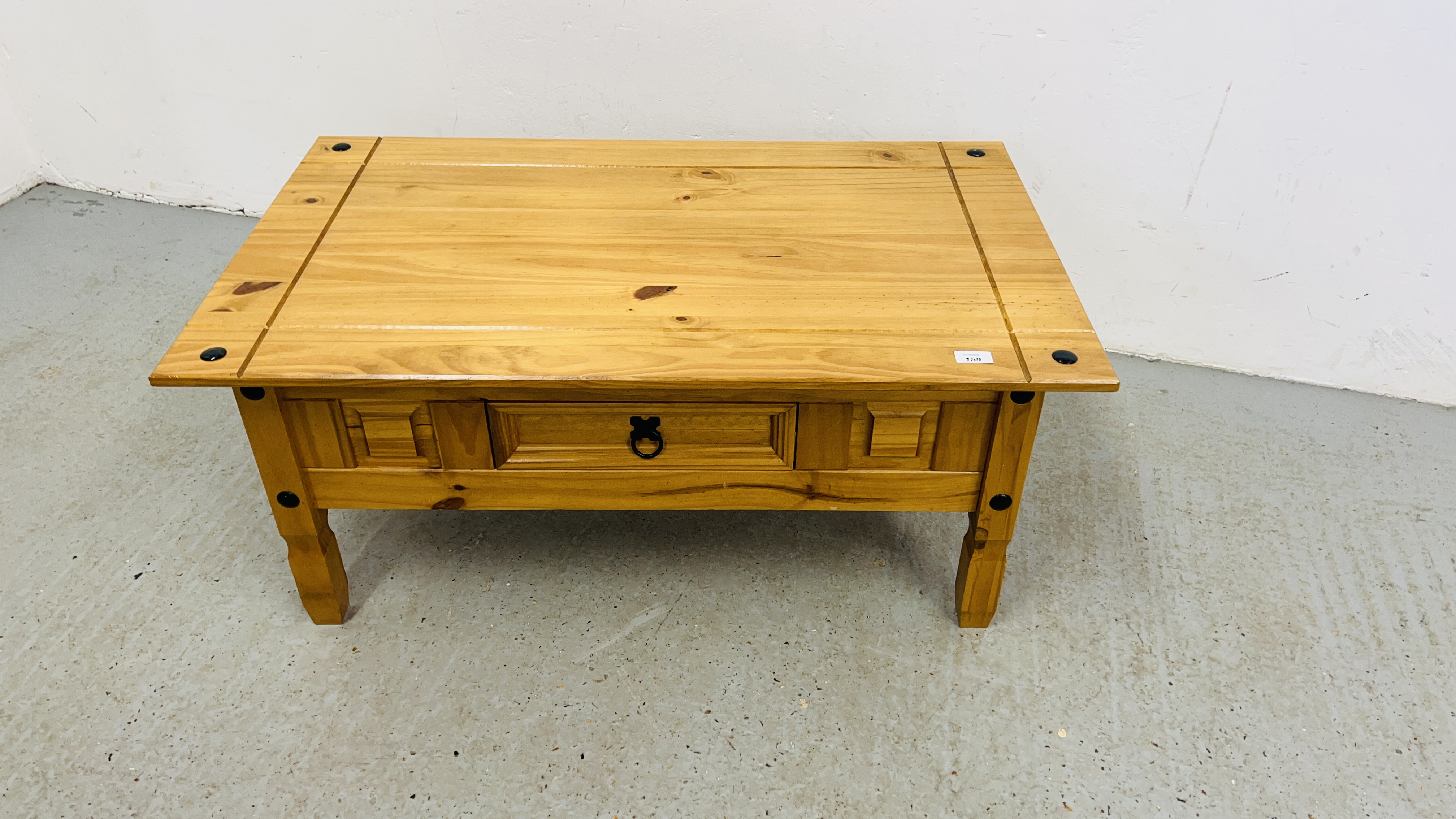 A MEXICAN PINE COFFEE TABLE WITH DRAWER W 101CM, D 61CM, H 45CM.
