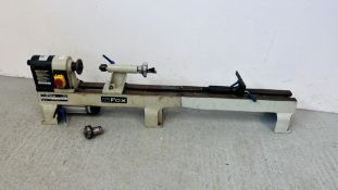 A FOX F46-251 WOOD TURNING LATHE.