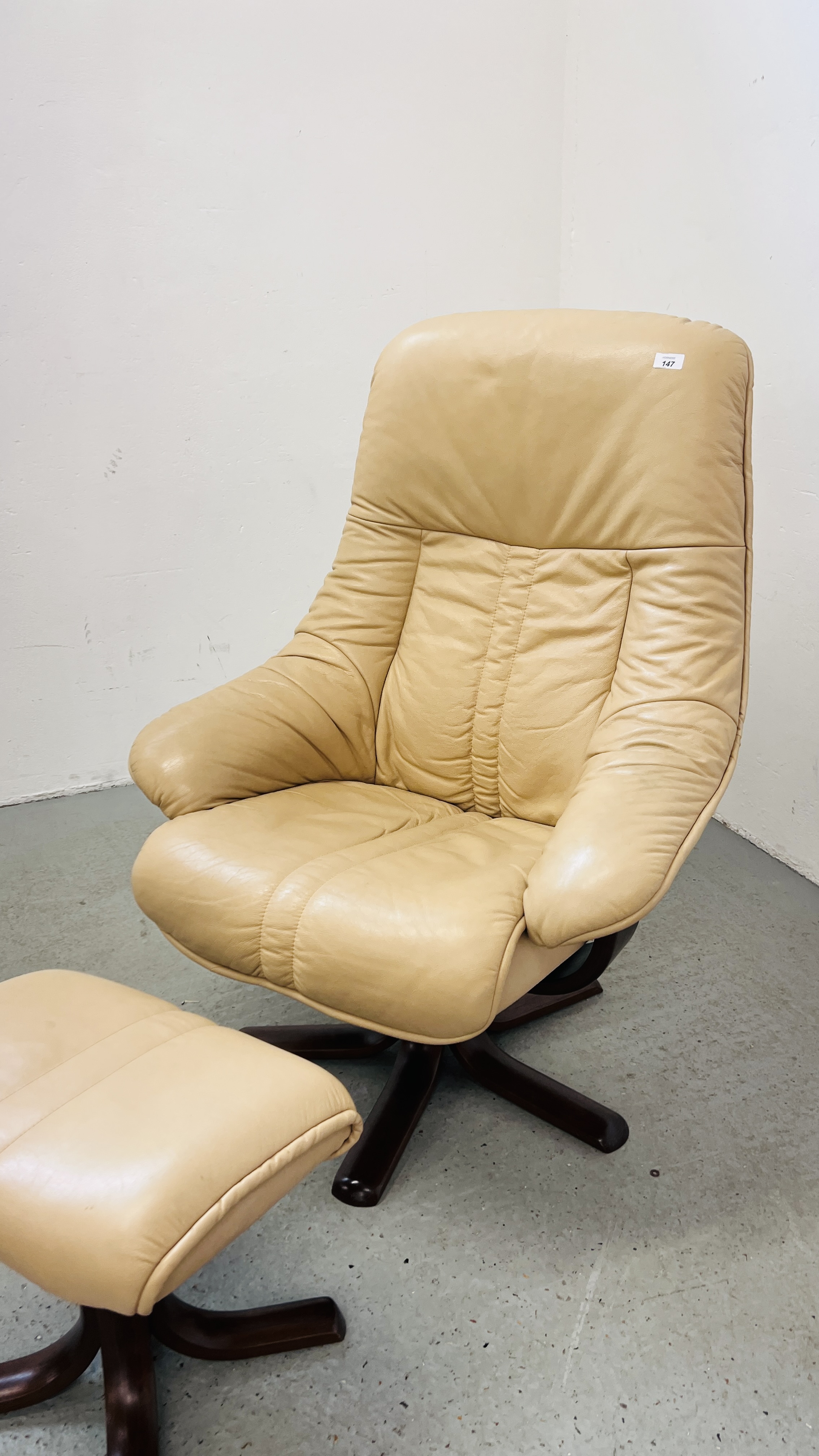 A CREAM LEATHER SWIVEL RELAXER CHAIR WITH MATCHING FOOTSTOOL - Image 2 of 11
