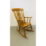 A GOOD QUALITY BEECHWOOD ROCKING CHAIR.