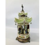 A VINTAGE PERGOLA DESIGN CERAMIC CIGARETTE DISPENSER WITH AUTOMATED MUSICAL ACTION A/F HEIGHT 45CM.