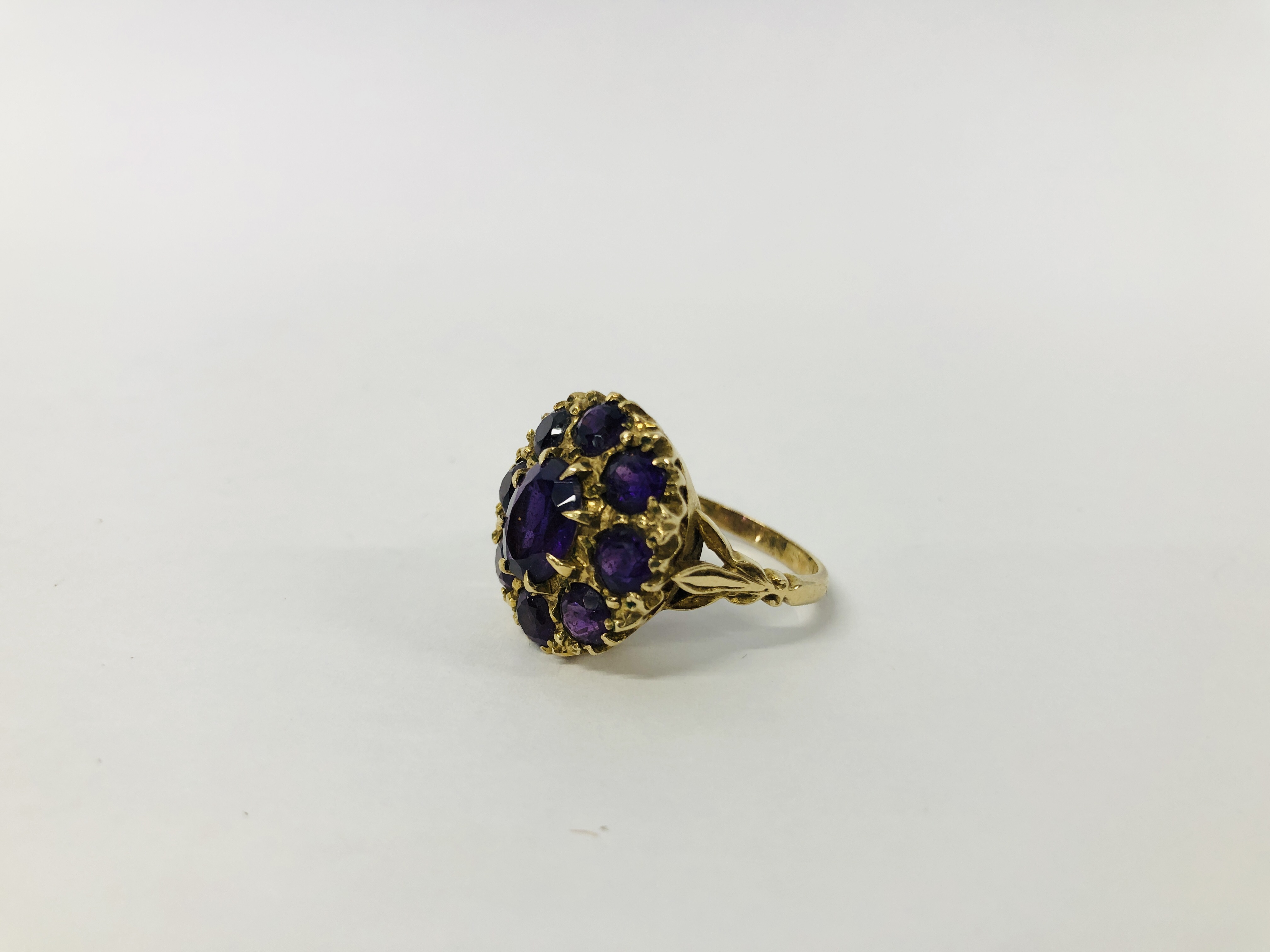 A 9CT. GOLD AMETHYST CLUSTER RING. - Image 2 of 7