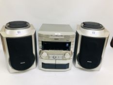 A PHILIPS 3 CD COMPACT ROTARY MUSIC SYSTEM COMPLETE WITH SPEAKERS AND BLAUPUNKT REMOTE - SOLD A