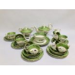 A VICTORIAN PART TEA SERVICE, DECORATED WITH BIRDS AND AN APPLE GREEN BORDER.