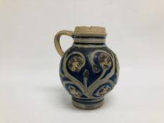 A WESTERWALD STONEWARE JUG WITH MEDALLION PORTRAIT OF WILLIAM III c.1700 (CHIP TO RIM).