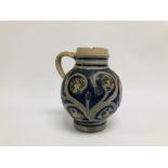 A WESTERWALD STONEWARE JUG WITH MEDALLION PORTRAIT OF WILLIAM III c.1700 (CHIP TO RIM).