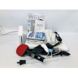 A NINTENDO Wii CONSOLE WITH VARIOUS ACCESSORIES TO INCLUDE CONTROLLERS,