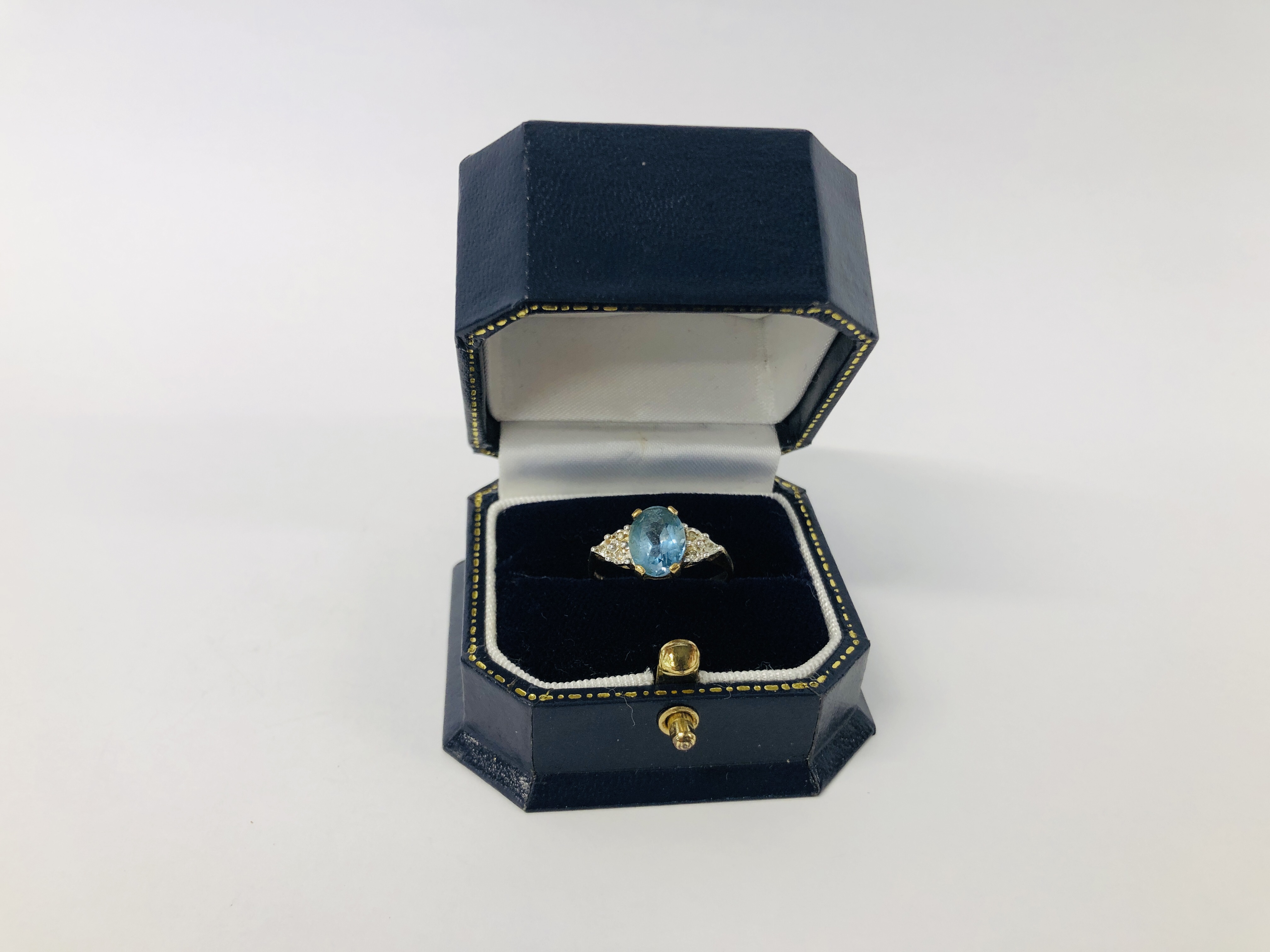 A 9CT. GOLD RING SET WITH CENTRAL AQUAMARINE AND DIAMONDS. - Image 2 of 9