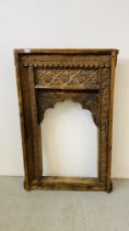 A VINTAGE INTRICATE HAND CARVED INDIAN MIRROR FRAME