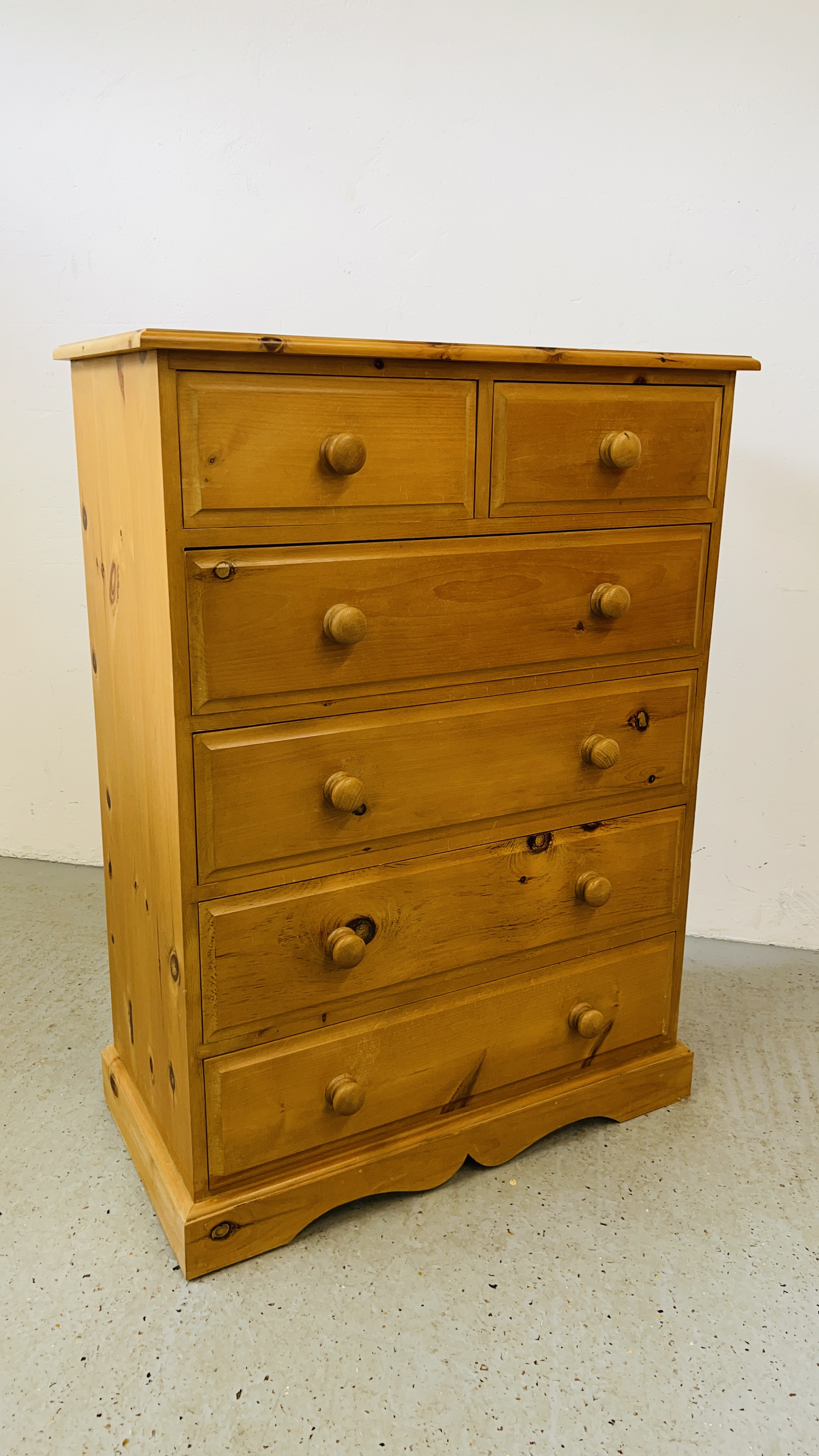 A SOLID PINE TWO OVER THREE CHEST OF DRAWERS W 85CM, D 43CM, H 117CM.