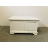 A MODERN WHITE FINISH BLANKET BOX WITH PANELLED DETAIL.