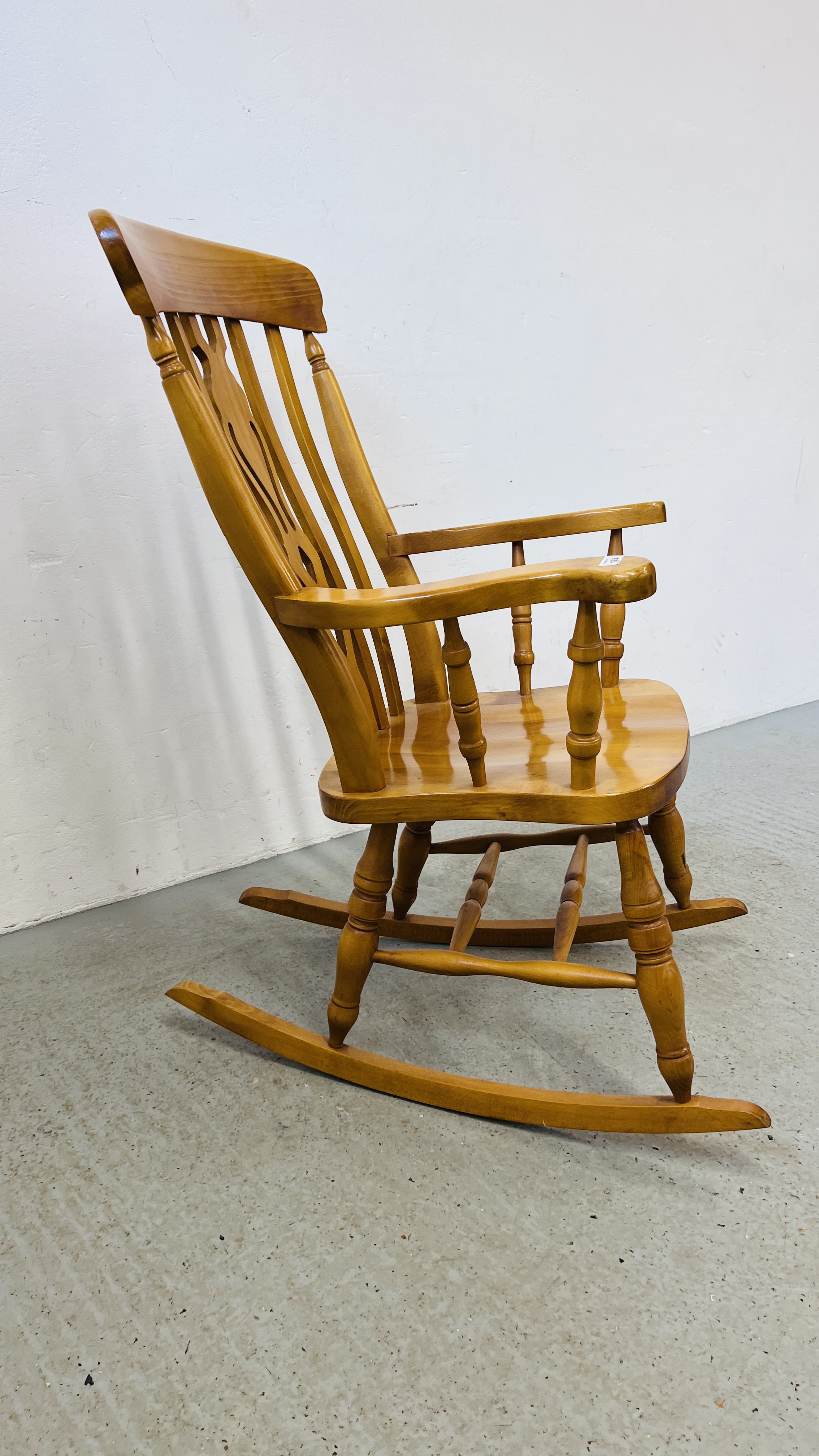 A GOOD QUALITY BEECHWOOD ROCKING CHAIR. - Image 6 of 7