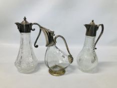 THREE SPIRIT DECANTERS - ONE IN THE FORM OF A DUCK, ONE WITH MASK LEAD SPOUT.