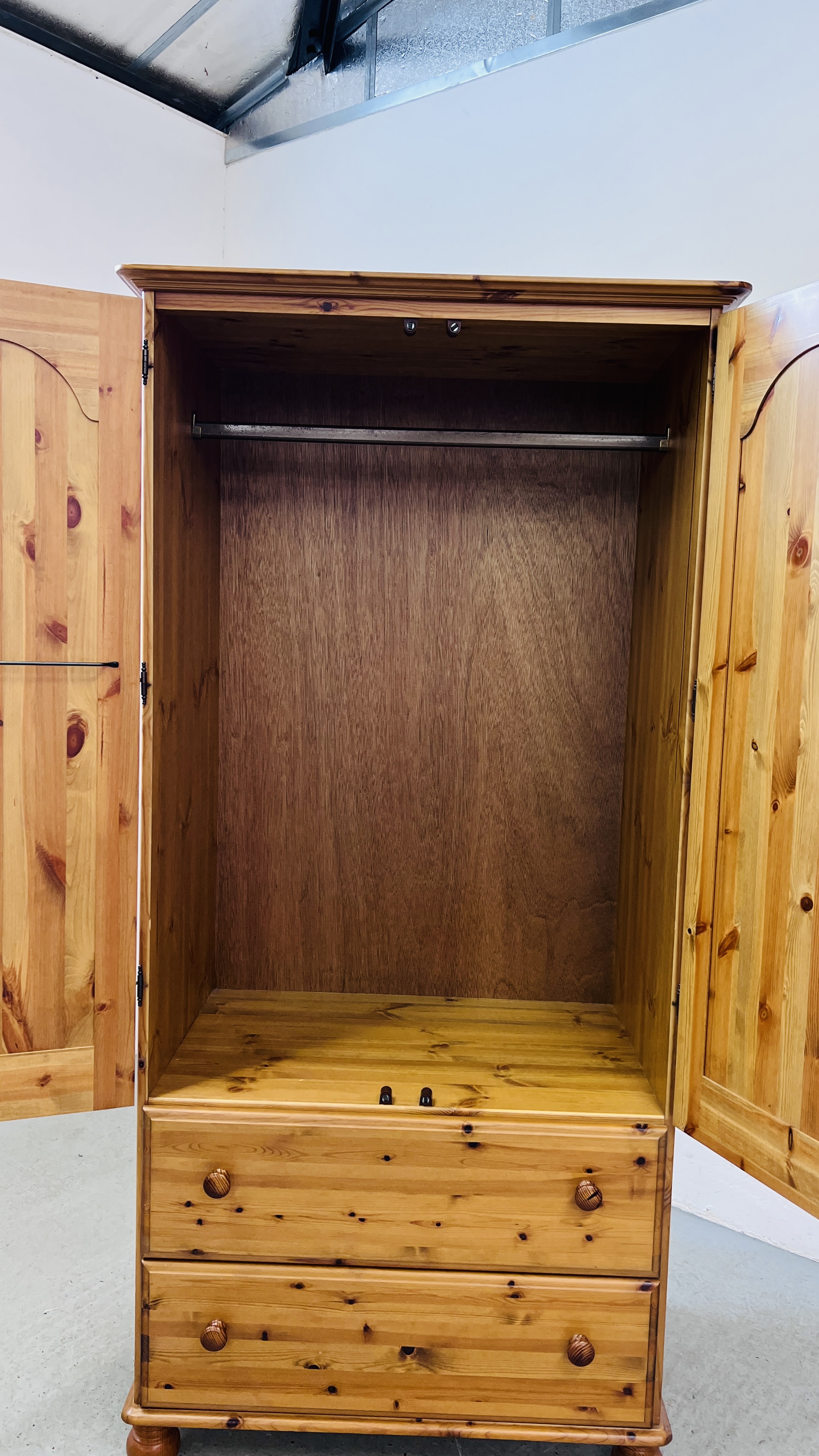 A GOOD QUALITY HONEY PINE TWO DOOR WARDROBE WITH TWO DRAWER BASE WIDTH 93CM. DEPTH 56CM. - Image 9 of 10