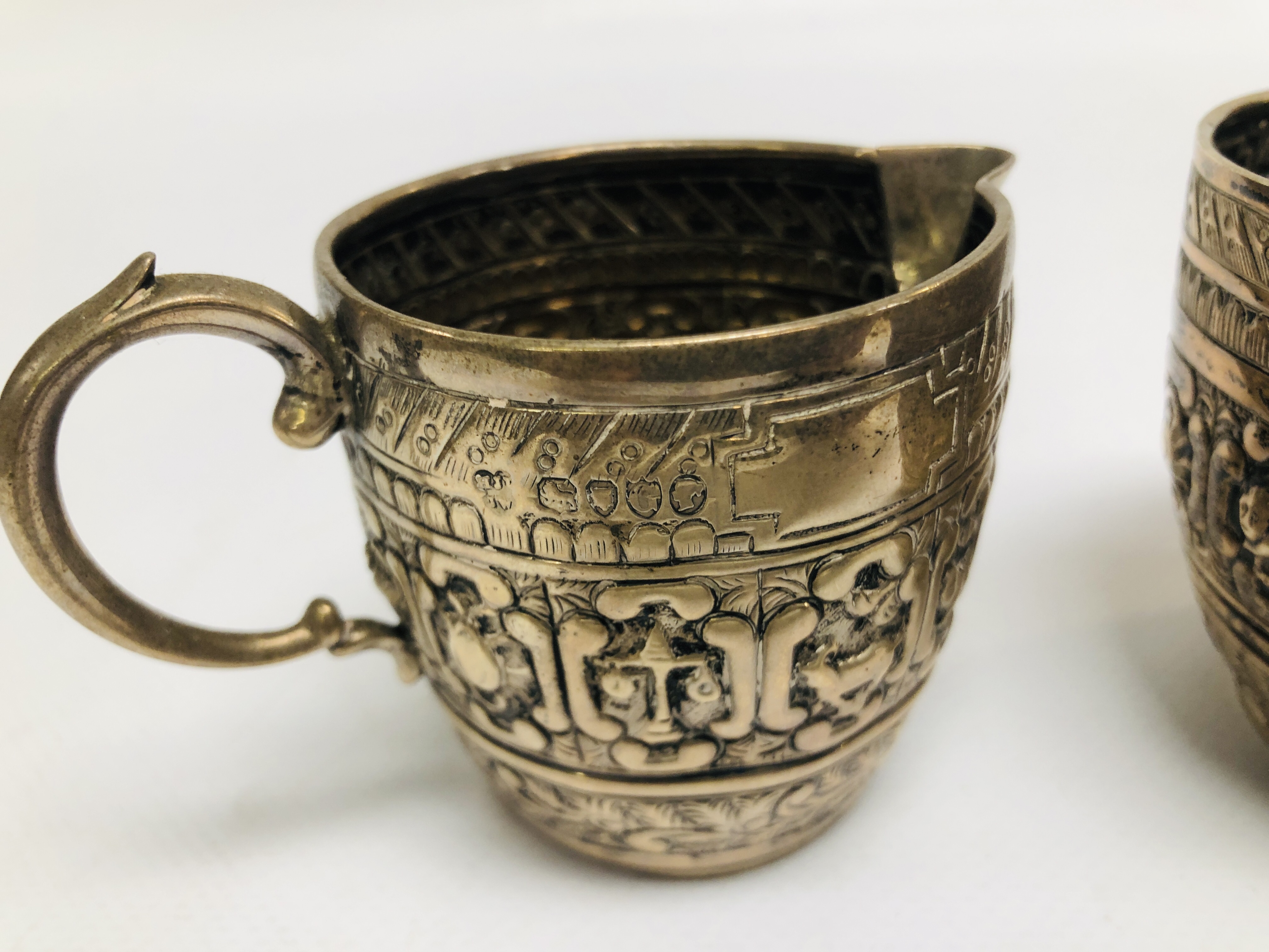 AN UNUSUAL SILVER SUGAR BOWL AND CREAM JUG EMBOSSED DECORATION DEPICTING ANIMALS, - Image 5 of 14