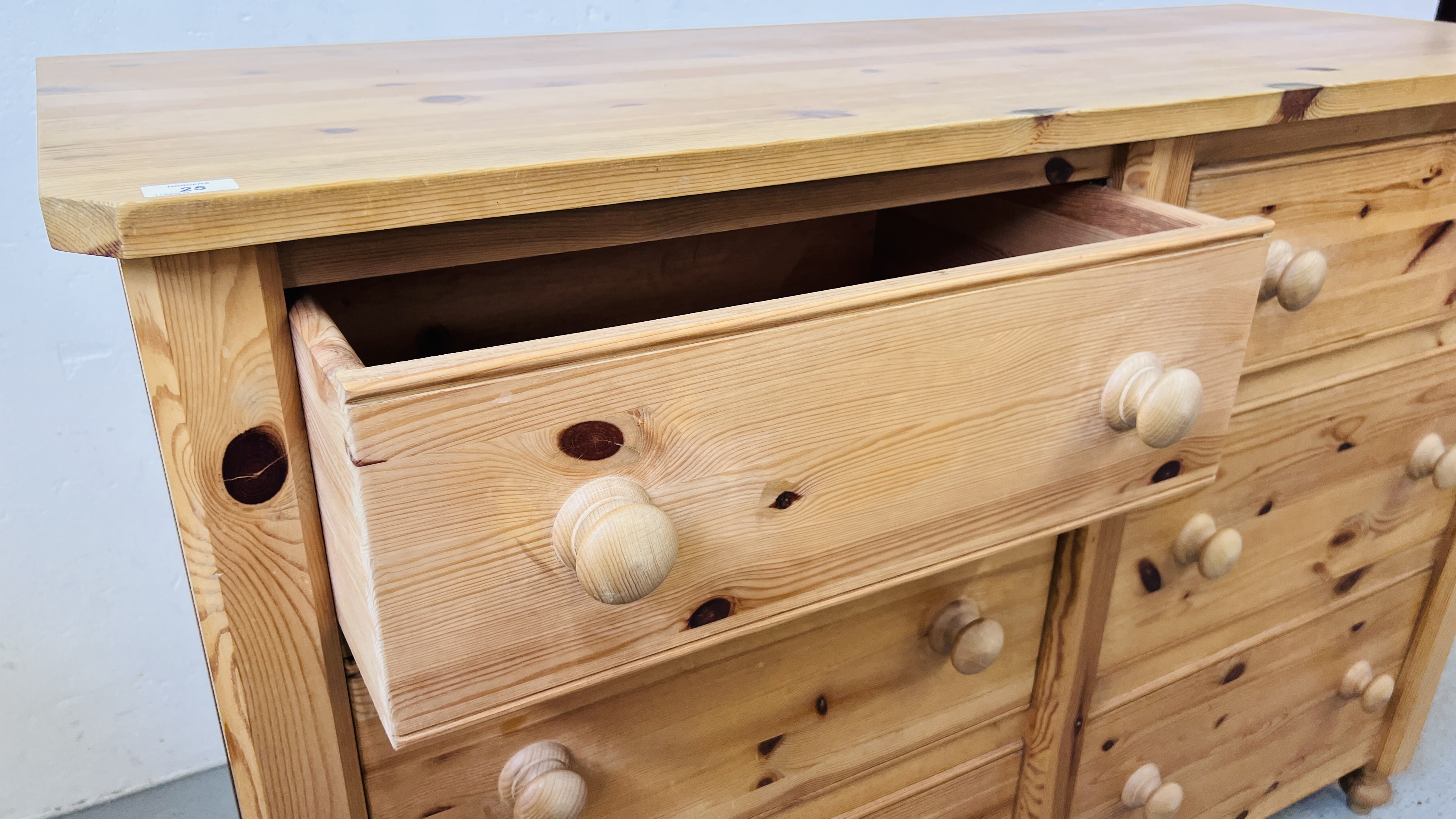 A LARGE SOLID PINE SIX DRAWER CHEST WITH TURNED KNOBS 144CM X 54CM X 101CM. - Image 6 of 6