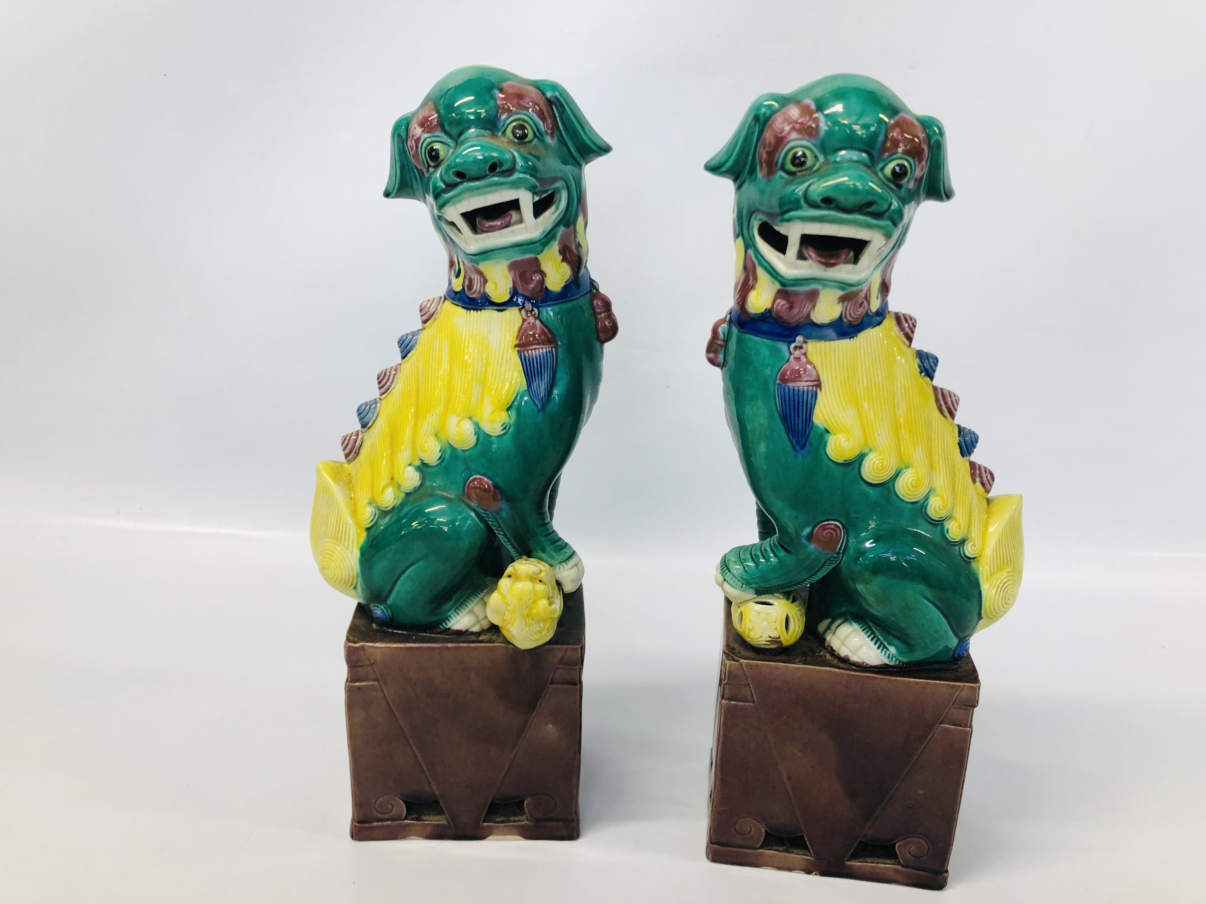 PAIR OF DECORATIVE C19th GLAZED FOO DOGS.