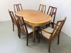 A NATHAN TEAK DINING SET COMPRISING OF EXTENDING OVAL DINING TABLE LENGTH 152CM,