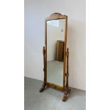 A GOOD QUALITY HONEY PINE FRAMED CHEVAL MIRROR HEIGHT 165CM. WIDTH 60CM.