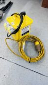 A 110V CARROLL & MEYNELL TRANSFORMER AND A 110V EXTENSION CABLE - SOLD AS SEEN.