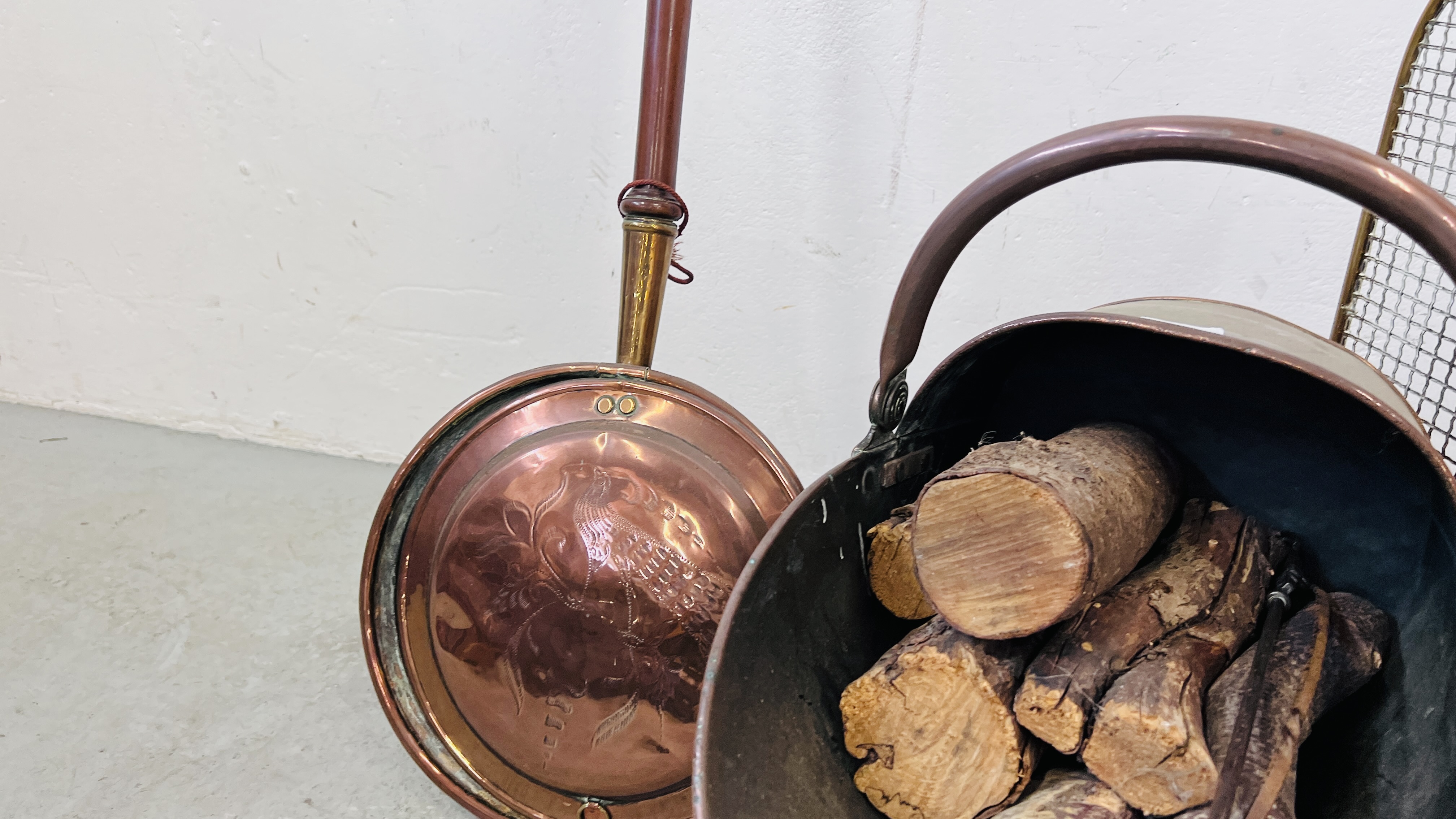 A HEAVY BRASS COPPER COAL HELMET, A VICTORIAN BRASS FOLDING SPARK GUARD, A COPPER BED WARMING PAN, - Image 4 of 5