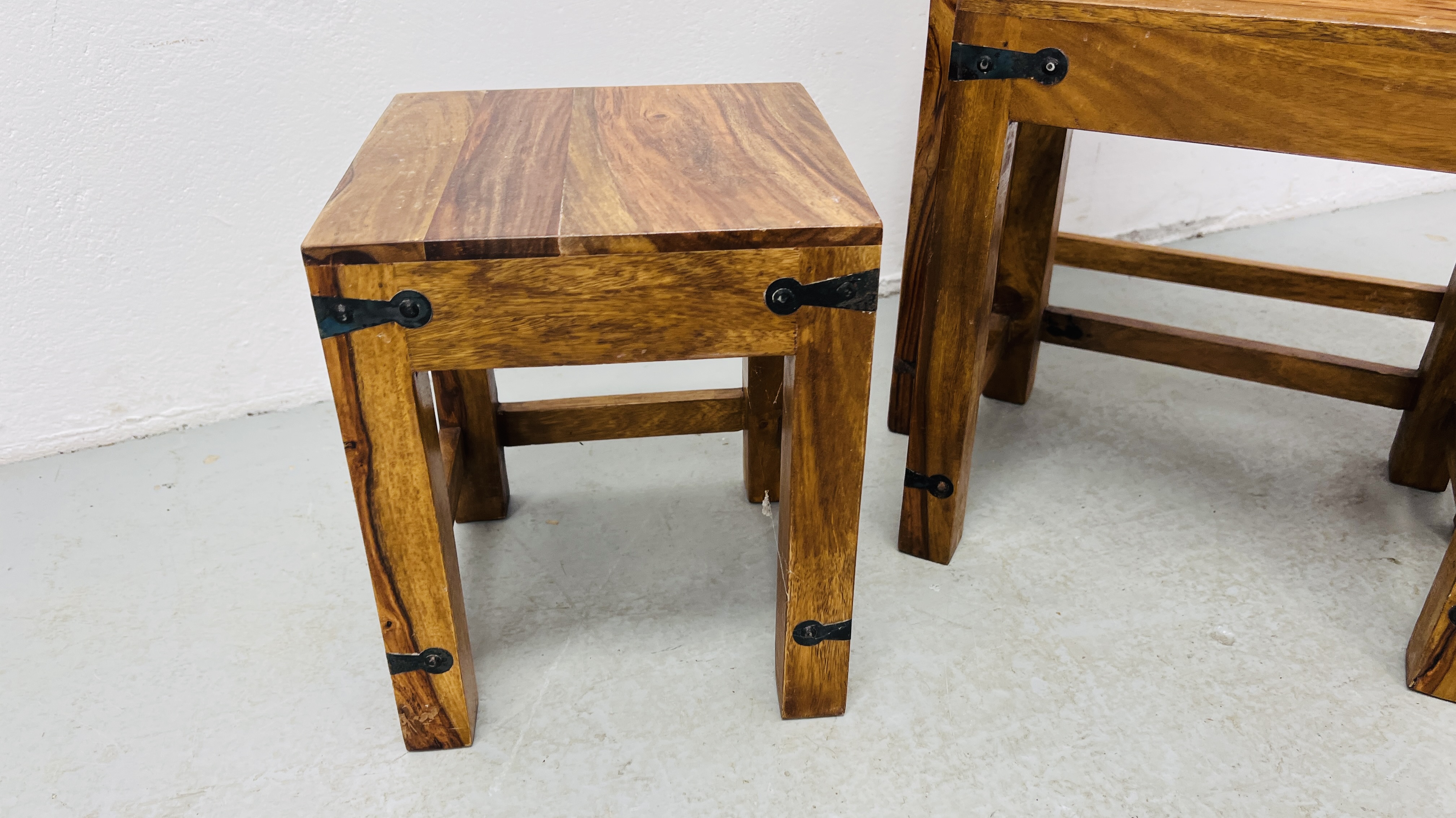 A NEST OF THREE MANGO WOOD GRADUATED TABLES. - Image 5 of 10