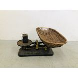 A VINTAGE MELLIN'S FOOD BABY WEIGHING SCALES L 50CM COMPLETE WITH WICKER BASKET 60CM X 33CM.