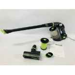 A GTECH MULTI K9 CORDLESS HAND HELD VACUUM WITH ACCESSORIES AND HANDBOOK - SOLD AS SEEN.