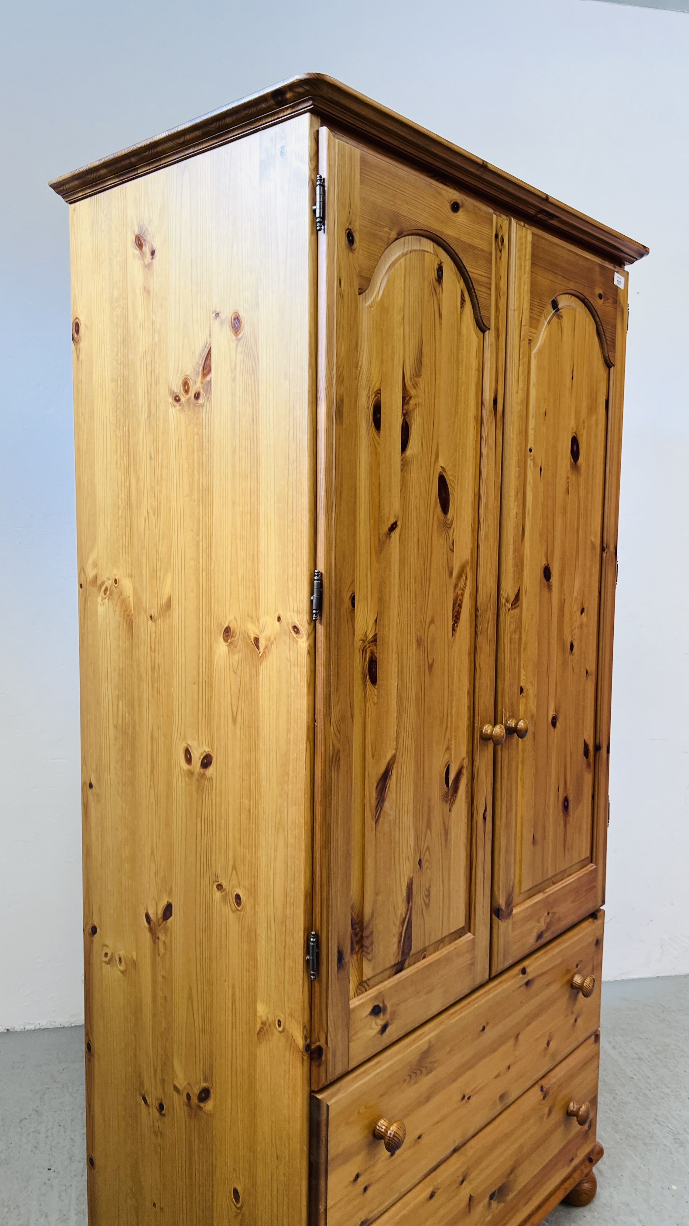 A GOOD QUALITY HONEY PINE TWO DOOR WARDROBE WITH TWO DRAWER BASE WIDTH 93CM. DEPTH 56CM. - Image 5 of 10