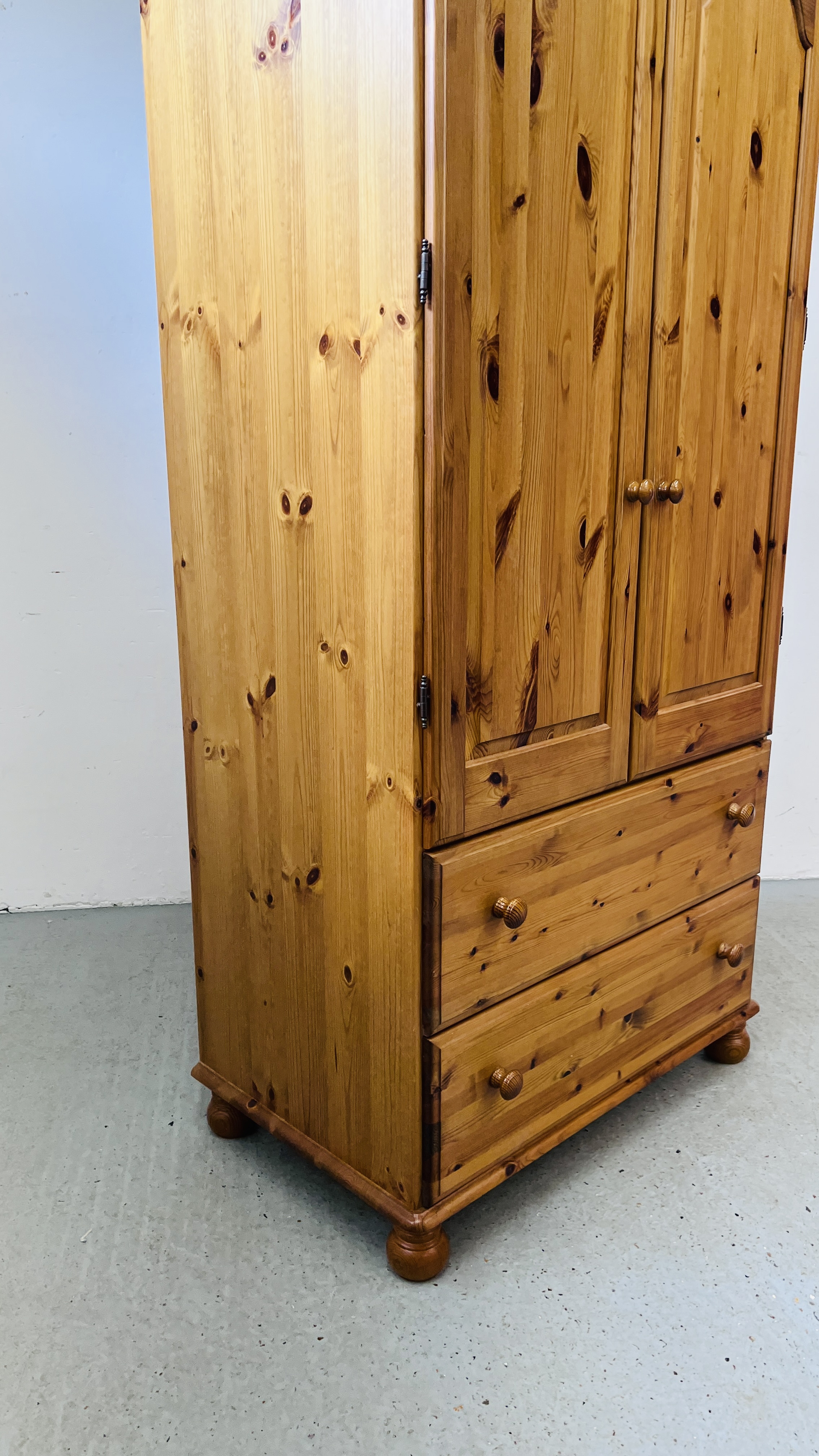 A GOOD QUALITY HONEY PINE TWO DOOR WARDROBE WITH TWO DRAWER BASE WIDTH 93CM. DEPTH 56CM. - Image 6 of 10