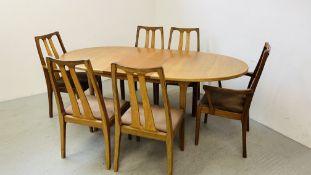 A RETRO MCINTOCH TEAK DINING TABLE COMPLETE WITH A SET OF SIX NATHAN DINING CHAIRS INCLUDING TWO