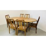 A RETRO MCINTOCH TEAK DINING TABLE COMPLETE WITH A SET OF SIX NATHAN DINING CHAIRS INCLUDING TWO