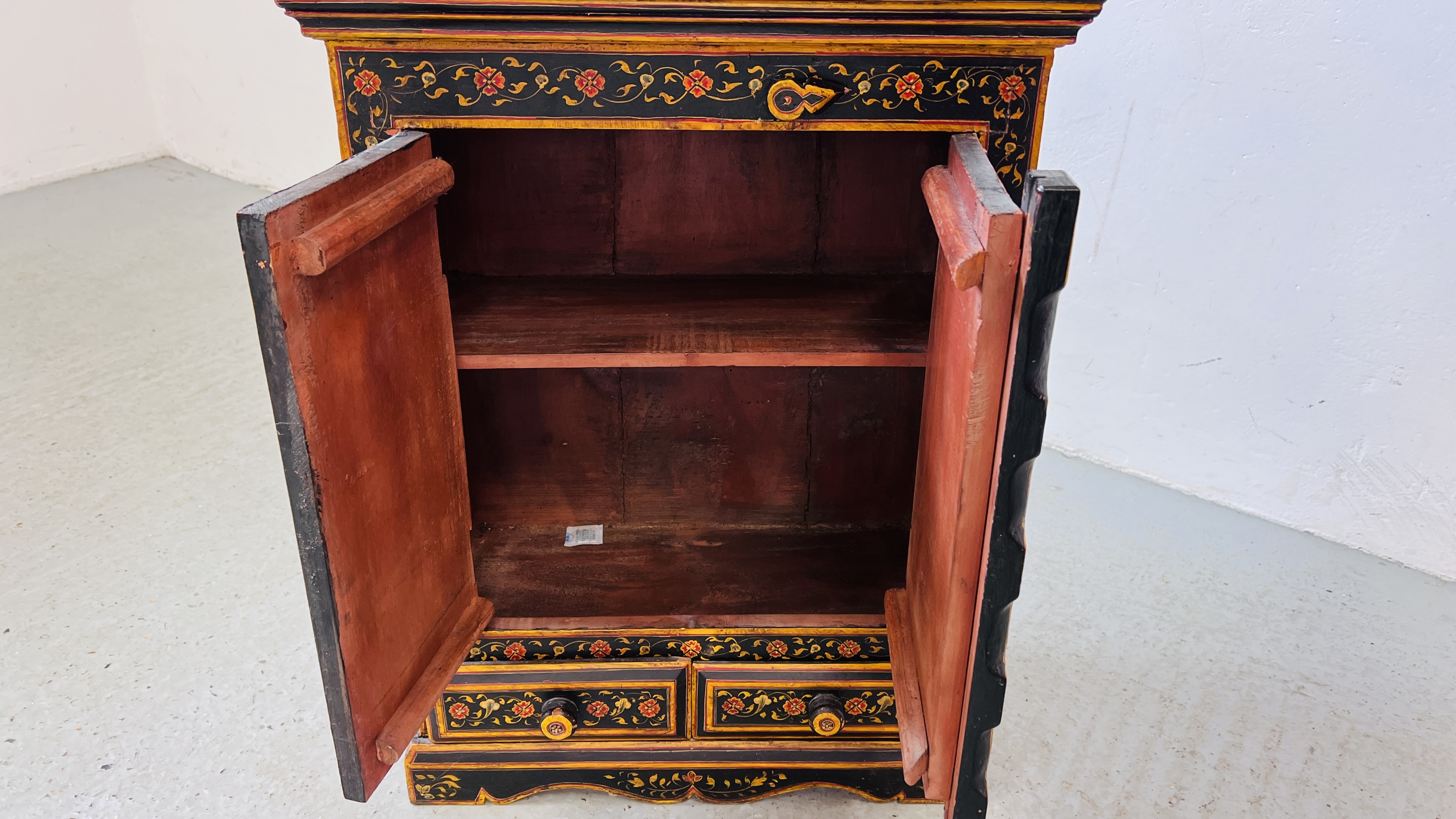 HARDWOOD EASTERN TWO DOOR TWO DRAWER CABINET WITH PAINTED CHASED AND FLOWER DECORATION, W 57CM, - Image 7 of 8